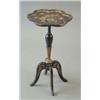 Image 1 : A Continental lobed circular floral painted papier mache wine table with baluster support and cab...