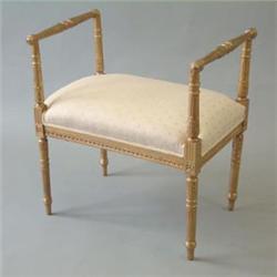A Louis XVI design gilt wood dressing stool with cream upholstered seat on fluted tapered legs, 2...