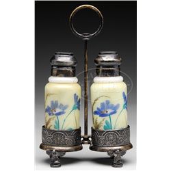 DECORATED SALT & PEPPER IN SILVER PLATED FRAME.