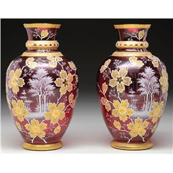PAIR OF ENAMELED MOSER VASES.