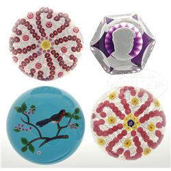 FOUR BACCARAT PAPERWEIGHTS.