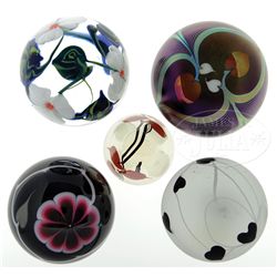 FIVE FLORAL PAPERWEIGHTS.