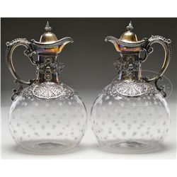 OUTSTANDING PAIR OF STERLING & GLASS ENGLISH CLARET JUGS.