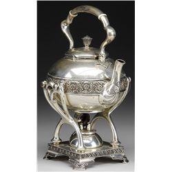 TIFFANY & CO. THREE-PART STERLING SILVER TEA KETTLE ON STAND.