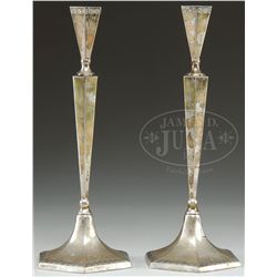 PAIR OF CONTINENTAL SILVER CANDLESTICKS.