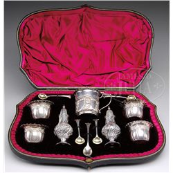 CASED SET OF STERLING SILVER SALTS, PEPPERS, & MUSTARD WITH SPOONS.
