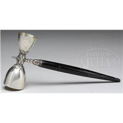 STERLING SILVER WOOD HANDLED SHOT MEASURE.