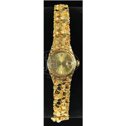 LADY'S GOLD NUGGET ROLEX WATCH.