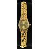 Image 1 : LADY'S GOLD NUGGET ROLEX WATCH.