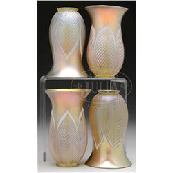 FOUR STEUBEN ART GLASS SHADES.