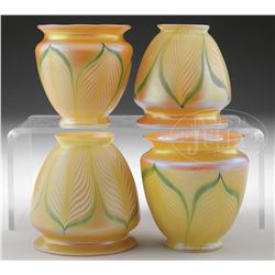 SET OF FOUR AMERICAN ART GLASS SHADES.