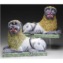 PAIR OF LUNEVILLE FAIENCE RECUMBENT LIONS.