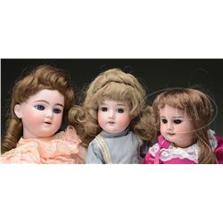 LOT OF 3 BISQUE HEAD DOLLS.