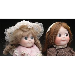 LOT OF TWO REPRODUCTION GOOGLIES.