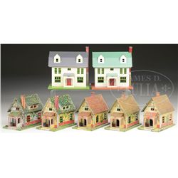 LOT OF SEVEN LIONEL TIN BUILDINGS.