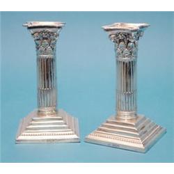 A pair of late Victorian silver Corinthian column candlesticks, makers Mappin & Webb, Sheffield 1...