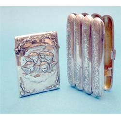 A late Victorian silver card case with Reynolds Angel decoration and an Edwardian 4 division ciga...
