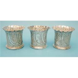 A set of 3 Edwardian silver vases with floral decoration, Sheffield 1902 £200-300...