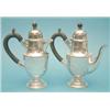 Image 1 : A pair of George V silver cafe au lait pots with ebonised handles (gross 25ozs) £250-300...