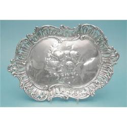 An Edwardian silver dressing table tray with pierced border and Reynolds Angel centre (12ozs) £10...