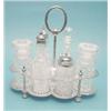 Image 1 : An Edwardian plated cruet stand fitted with 6 cut glass condiment bottles £250-300...