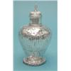 Image 1 : A 17th century Dutch silver baluster shape tea caddy with domed cover and foliage and scallop she...