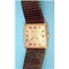 Image 1 : A gentlemans 9ct gold Bueche Girod wrist watch with textured dial and Roman numerals £300-400...