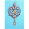 Image 1 : An Edwardian 15ct gold heart shaped openwork pendant set peridots and seed pearls £100-150...