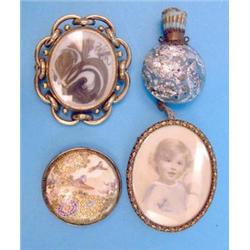 A Victorian gilt metal swivel brooch, a miniature of a young child, a scent flask and satsuma buc...