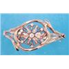Image 1 : A 14k gold hinged bangle, the openwork scrolled front with a central diamond and seed pearl set 6...