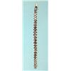 Image 1 : A white gold graduated line bracelet set oval sapphires flanked by rows of small diamonds, 6.75in...