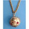 Image 1 : A yellow metal curblink chain with spherical gold pendant set turquoises and red pastes £100-150...