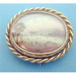 A Victorian painted porcelain plaque depicting a study of the Great Exhibition 1851, in a gold pl...