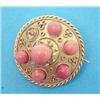 Image 1 : A Victorian bloomed gold circular brooch with cannetille work decoration set coral beads £100-150...