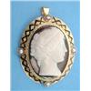 Image 1 : A Continental oval hardstone cameo brooch/pendant carved with a classical female profile, the gol...