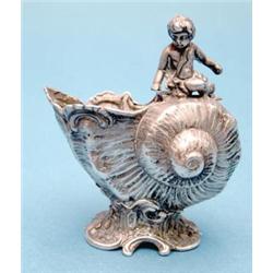 A Continental silver nautilus shell salt, 3ins. £100-150...