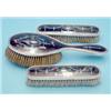 Image 1 : A set of 3 George V silver and tortoiseshell pique hair brushes £100-150...