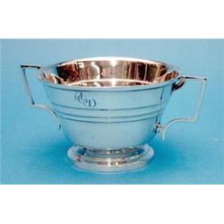 A George V Art Deco design silver sugar bowl £60-80...