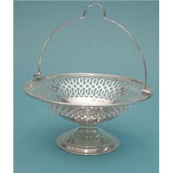 A George VI silver octagonal baluster caster, 7ins. £120-150...