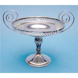 A George V silver pedestal bonbon dish with scroll handles £100-120...