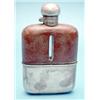 Image 1 : A George V silver mounted glass pocket flask with cut base £100-120...