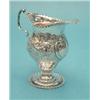 Image 1 : A Victorian George II design silver helmet cream jug £120-140...