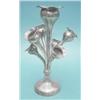 Image 1 : A George V silver epergne of organic form with 7 vases, 11ins. £150-200...