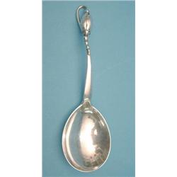 A Georg Jensen sterling serving spoon with floral design handle £200-300...