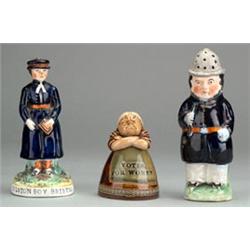 19th Century Staffordshire figure 'Colston Boy Bristol', wearing a blue hat and coat with puce hi...