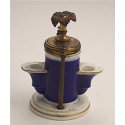 19th Century porcelain partners inkwell having a cylindrical body with two protruding bow shaped...