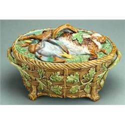 19th Century Mintons two handled majolica game dish, the cover decorated with a hare and mallard,...