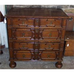 Early 18th Century oak two section chest having a moulded edge and four long drawers with moulded...