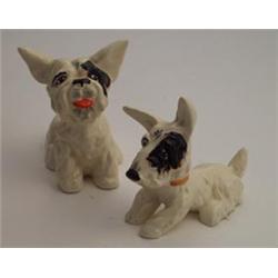 Crown Devon figure of a Highland Terrier with protruding tongue, high glaze, 5" high and a simila...