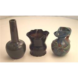 Eltonware bulbous shaped ewer with raised foliate decoration on a mottled blue, green and brown g...
